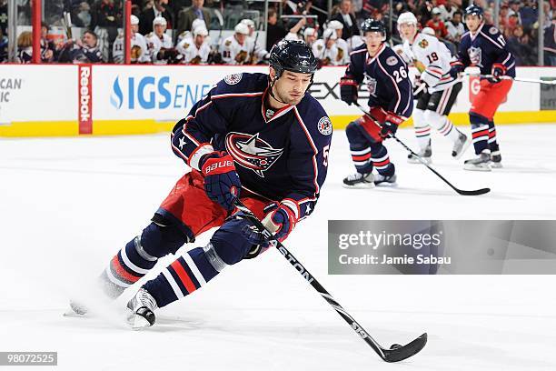 Defenseman Fedor Tyutin of the Columbus Blue Jackets skates with the puck against the Chicago Blackhawks on March 25, 2010 at Nationwide Arena in...