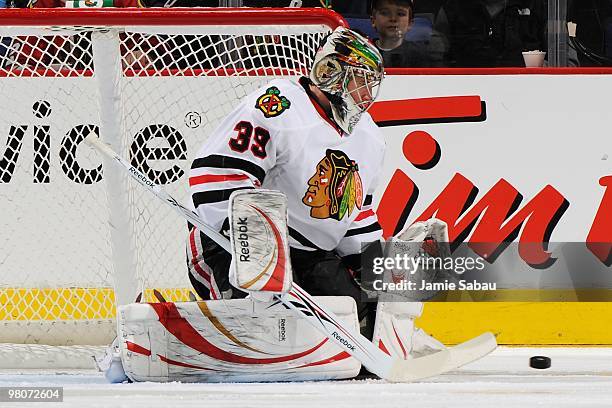 Goaltender Cristobal Huet of the Chicago Blackhawks makes a save against the Columbus Blue Jackets on March 25, 2010 at Nationwide Arena in Columbus,...