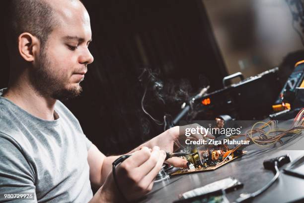 precision soldering - soldered stock pictures, royalty-free photos & images