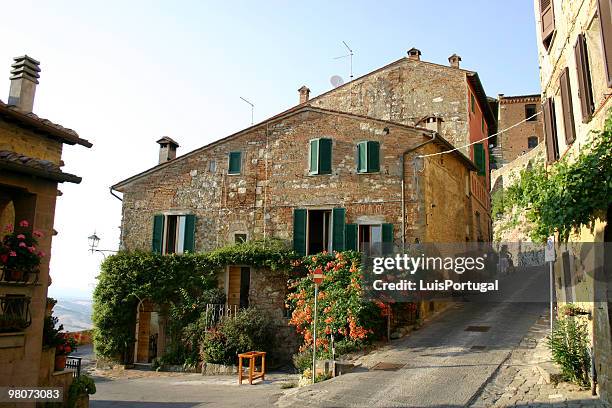 picture of a city street in montepulciano, italy - montepulciano stock pictures, royalty-free photos & images