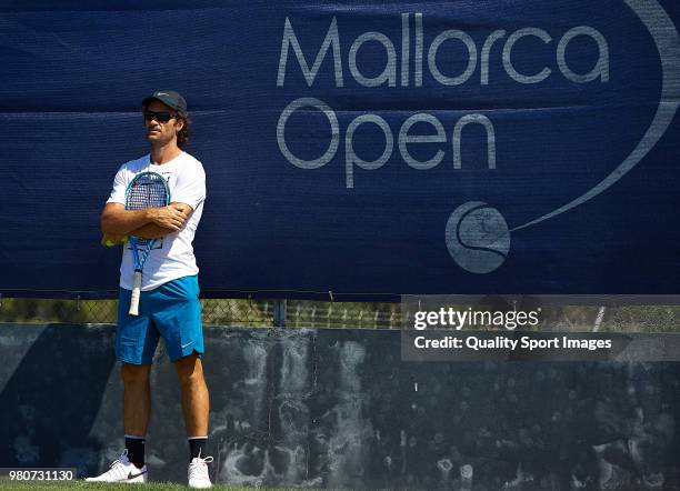 Carlos Moya, coach to Rafael Nadal of Spain looks on during a practice session during day two of the WTA Mallorca Open at Country Club Santa Ponsa on...