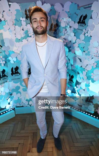 Douglas Booth attends as Tiffany & Co. Celebrates the launch of the Tiffany Paper Flower collection at The Lindley Hall on June 21, 2018 in London,...