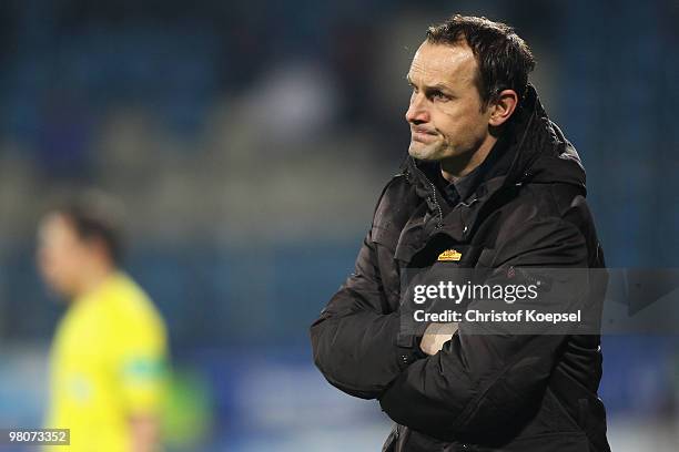 Head coach Heiko Herrlich of Bochum looks dejected after losing 1-2 the Bundesliga match between VfL Bochum and Eintracht Frankfurt at Rewirpower...