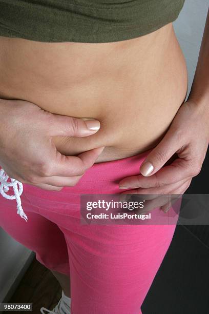 fat check - adipose cell stock pictures, royalty-free photos & images