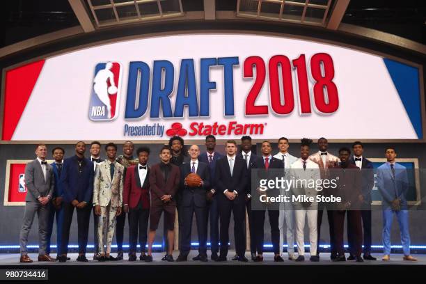 Commissioner Adam Silver poses with Donte DiVincenzo, Jerome Robinson, Mikal Bridges, Kevin Knox, Shai Gilgeous-Alexander, Wendell Carter Jr., Collin...