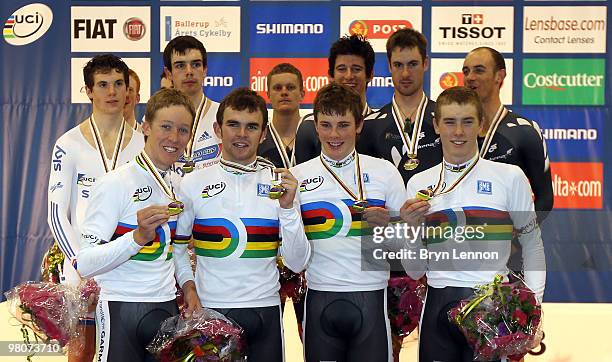 The Australia Pursuit Team of Cameron Meyer, Jack Bobridge, Michael Hepburn and Rohan Dennis pose with their medals after winning the Men's Team...