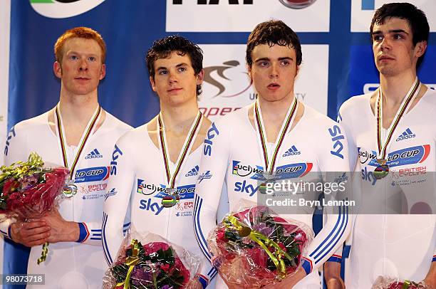 The Great Britain Team of Ed Clancy; Ben Swift, Steven Burke and Andrew Tennant take second in the Men's Team Pursuit on Day Three of the UCI Track...