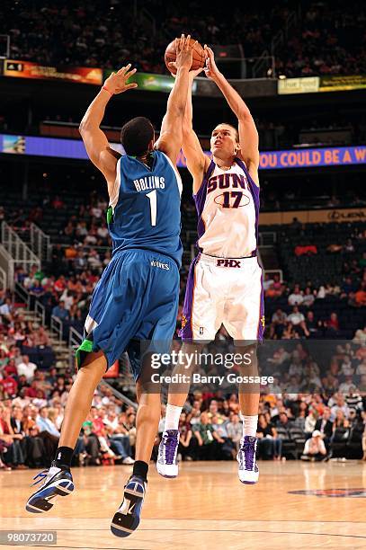 Louis Amundson of the Phoenix Suns shoots a jump shot against Ryan Hollins of the Minnesota Timberwolves during the game at U.S. Airways Center on...