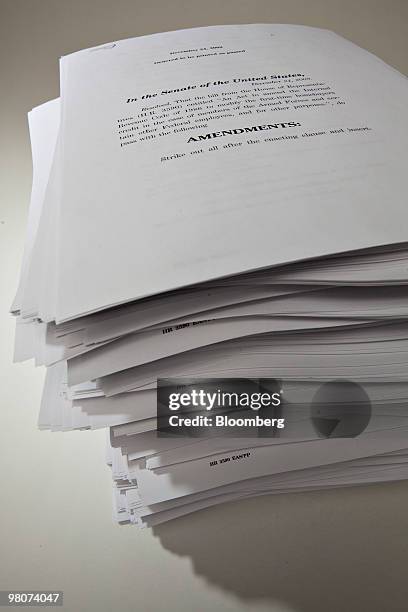 The 2,409 pages of H.R. 3590, the Patient Protection and Affordable Care Act, are displayed for a photograph in New York, U.S., on Friday, March 26,...