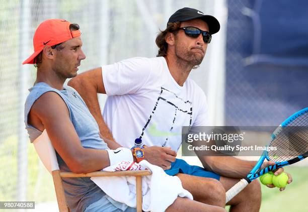 Rafael Nadal of Spain and coach Carlos Moya in a practice session during day fourth of the WTA Mallorca Open at Country Club Santa Ponsa on June 21,...