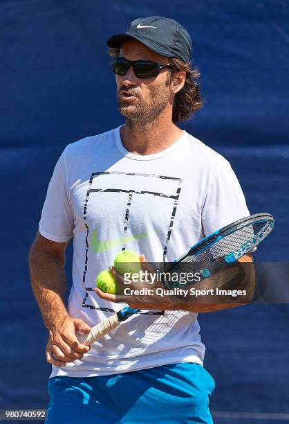 Carlos Moya, coach to Rafael Nadal of Spain looks on during a practice session during day fourth of the WTA Mallorca Open at Country Club Santa Ponsa...