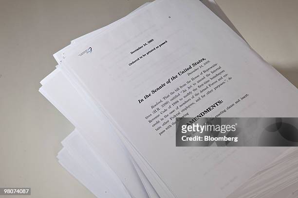 The 2,409 pages of H.R. 3590, the Patient Protection and Affordable Care Act, are displayed for a photograph in New York, U.S., on Friday, March 26,...