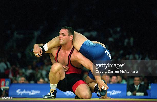 Gabriel Szerda of Australia in action during the Men's 97kg Greco Roman Wrestling held at the Sydney Convention Centre during the Sydney 2000...