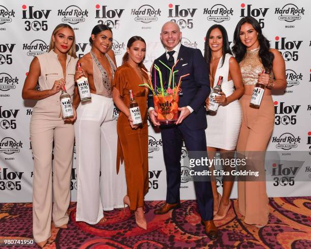 Armando Christian Perez aka Pitbull and his official dancers, The Most Bad Ones, attend the grand opening of iLov305 at Hard Rock Hotel and Casino...