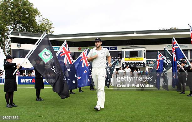 Captain Daniel Vettori playing his 100th test match for New Zealand leads his side out for day one of the Second Test match between New Zealand and...