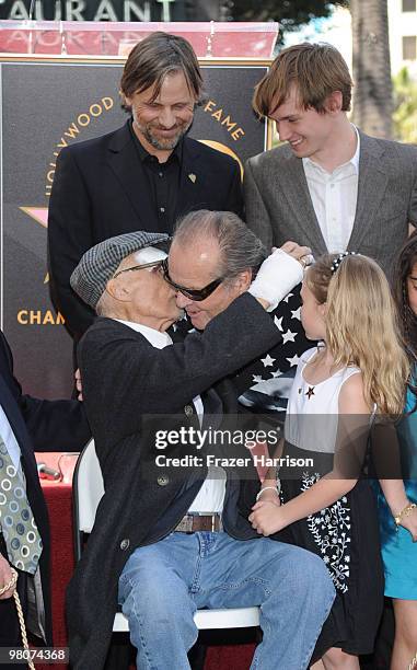 Actor Dennis Hopper,who was honored with the 2,403rd Star on the Hollywood Walk of Fame is congratulated by Jack Nicholson, actor, watched on by...