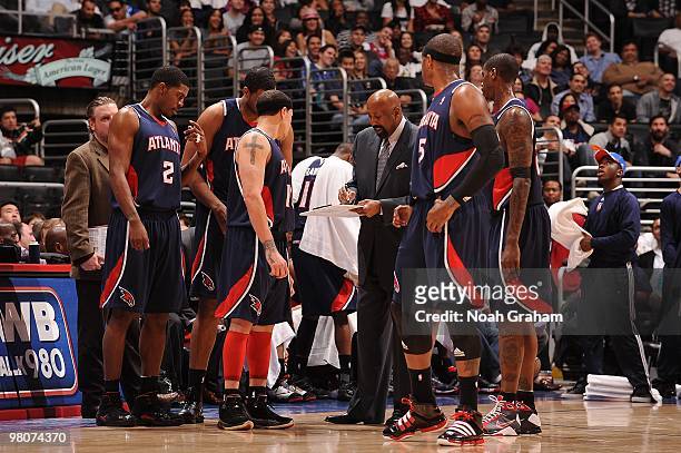 Head coach Mike Woodson of the Atlanta Hawks talks to his team during the game against the Los Angeles Clippers at Staples Center on February 17,...