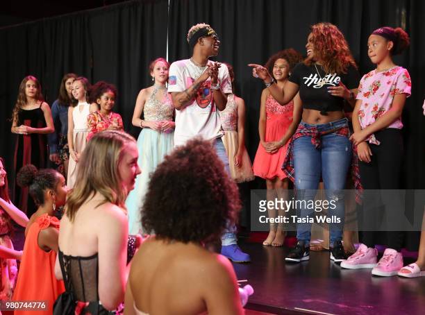Rapper Silento and musical artist Tyeler Reign perform onstage at Jillian Estell's red carpet birthday party with a purpose benefitting The Celiac...
