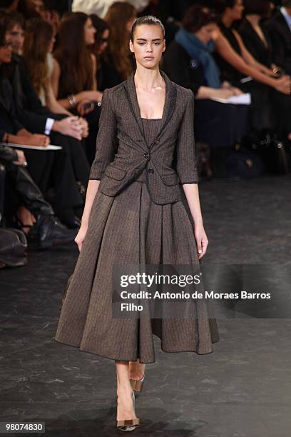 Model walks the runway during the Louis Vuitton Ready to Wear show as part of the Paris Womenswear Fashion Week Fall/Winter 2011 at Cour Carree du...