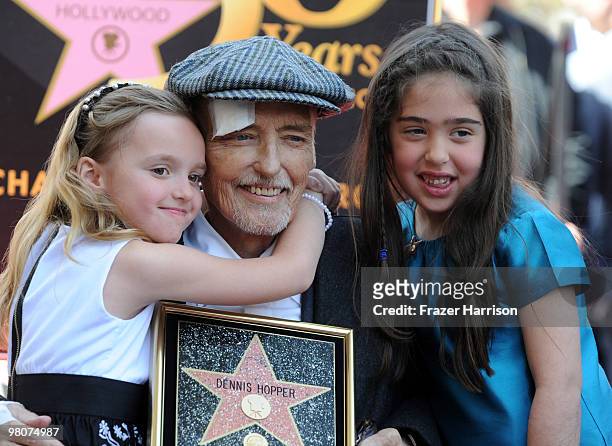 Actor Dennis Hopper, who was honored with the 2,403rd Star on the Hollywood Walk of Fame poses with his family Galen Grier Hopper,daughter. And...