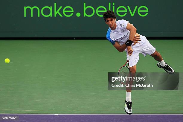 Thomaz Bellucci of Brazil serves against James Blake of the United States during day four of the 2010 Sony Ericsson Open at Crandon Park Tennis...