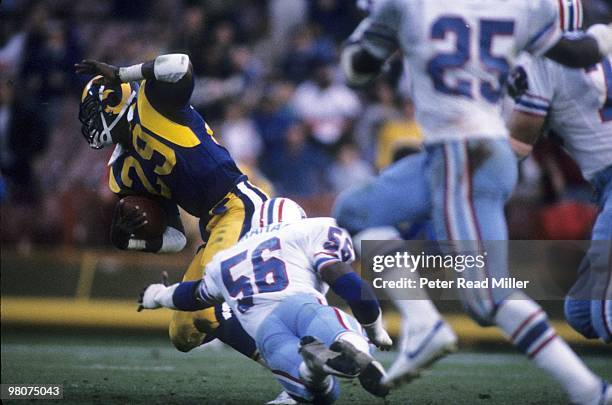 Los Angeles Rams Eric Dickerson in action vs Houston Oilers Robert Abraham . Anaheim, CA 12/9/1984 CREDIT: Peter Read Miller