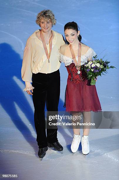 Meryl Davis and Charlie White of USA poses for the photographer with their Silver medals after the Ice Dance Free Dance at the 2010 ISU World Figure...