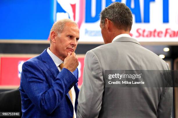 Head coach John Beilein of the Michigan Wolverines speaks to head coach of Jay Wright of the Villanova Wildcats during the 2018 NBA Draft at the...