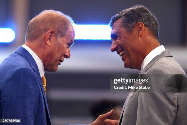 Head coach John Beilein of the Michigan Wolverines speaks to head coach of Jay Wright of the Villanova Wildcats during the 2018 NBA Draft at the...