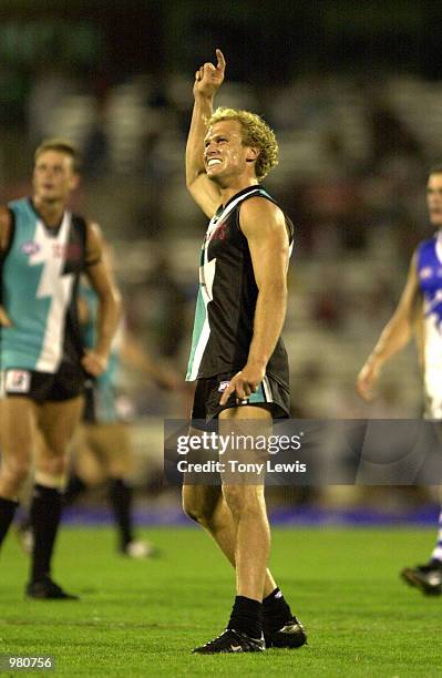 Chad Cornes for Port Adelaide celebrates as his kick after the final siren goes through for a goal in the Ansett Cup semi-final match between Port...