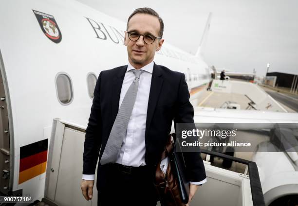 March 2018, Poland, Warsaw: German Foreign Affairs Minister Heiko Maas of the Social Democratic Party standing at the entrance of a government plane...