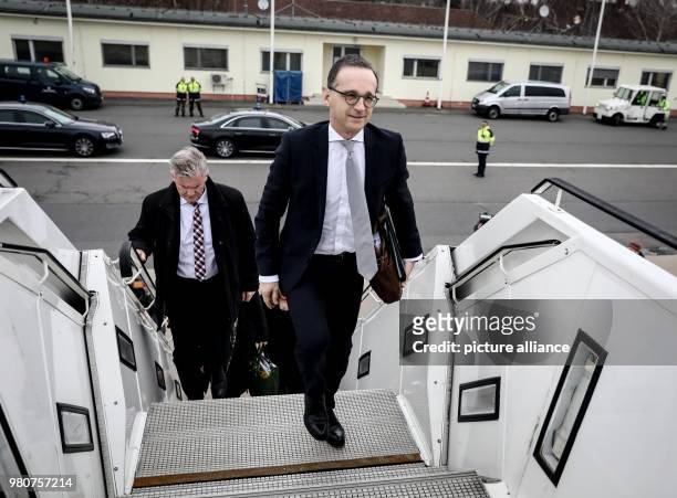 March 2018, Poland, Warsaw: German Foreign Affairs Minister Heiko Maas of the Social Democratic Party climbing the gangway to a government plane of...