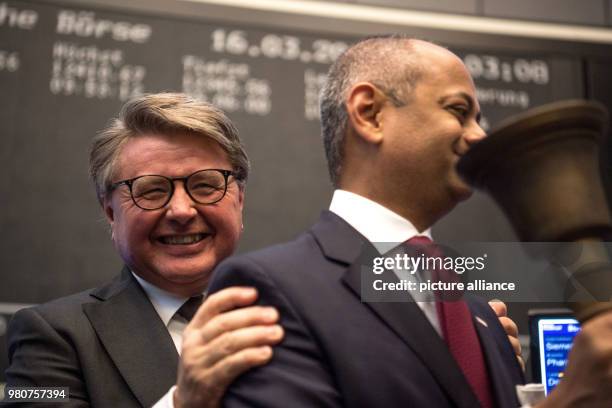 March 2018, Germany, Frankfurt/Main: Theodor Weimer , CEO of Deutsche Börse AG, celebrates the flotation of Siemens Healthineers at the Frankfurt...