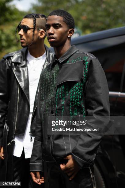 Quincy Brown and Christian Combs are seen on the street during Paris Men's Fashion Week S/S 2019 wearing Rick Owens on June 21, 2018 in Paris, France.