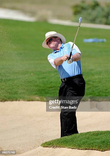 Tom Kite hits onto the fourth green during the first round of The Cap Cana Championship on March 26, 2010 on the Jack Nicklaus Course at Punta Espada...