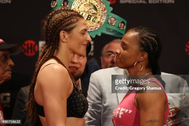 Christina Hammer of Germany and Tori Nelson face off after their weigh-in prior to their WBC and WBO Middleweight World Championship at the Masonic...