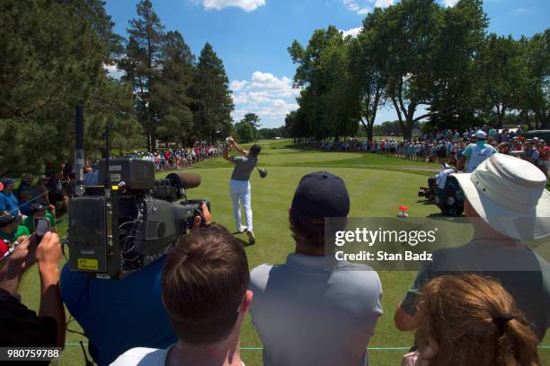 Jordan Spieth plays a tee shot on the sixth hole during the first round of the Travelers Championship at TPC River Highlands on June 21, 2018 in...