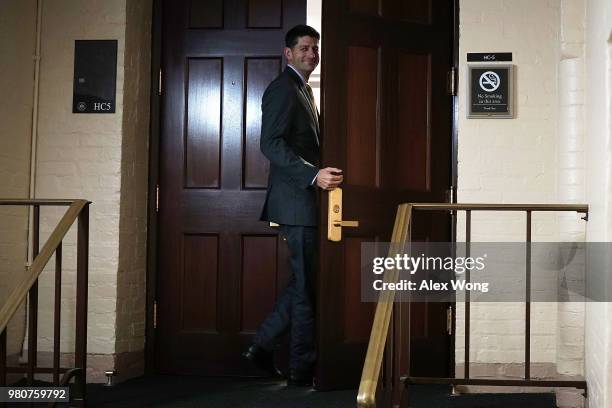 Speaker of the House Rep. Paul Ryan returns to the room after a short break during a House Republican closed door meeting on immigration June 21,...