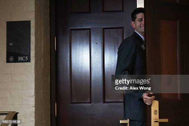 Speaker of the House Rep. Paul Ryan returns to the room after a short break during a House Republican closed door meeting on immigration June 21,...