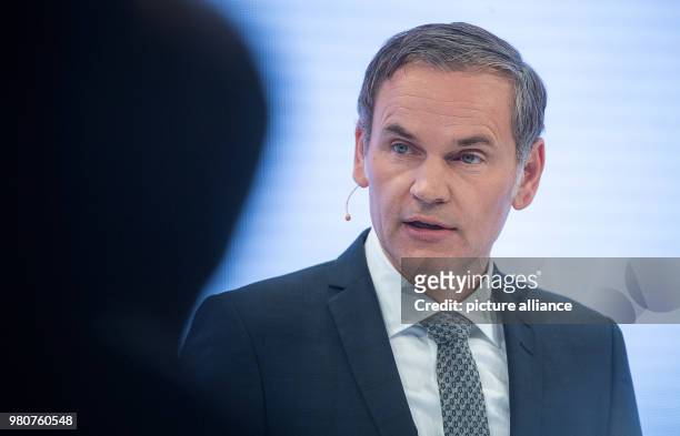 March 2018, Germany, Stuttgart: Oliver Blume, CEO of Porsche AG, presents his company's results from the year 2017 at an annual press conference....