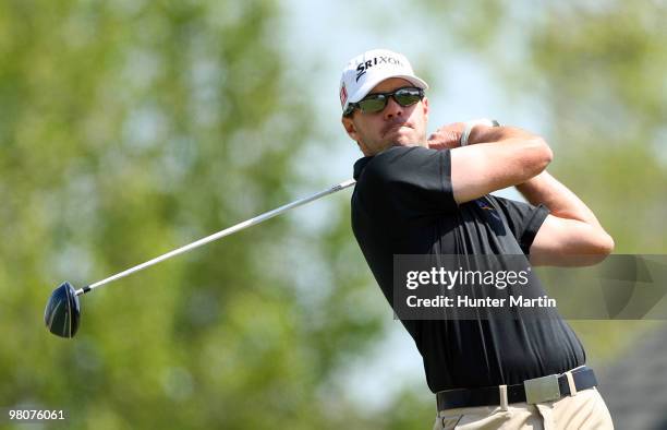 Bobby MacWhinnie hits his tee shot on the 12th hole during the second round of the Chitimacha Louisiana Open at Le Triomphe Country Club on March 26,...