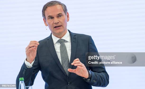March 2018, Germany, Stuttgart: Oliver Blume, CEO of Porsche AG, presents his company's results from the year 2017 at an annual press conference....