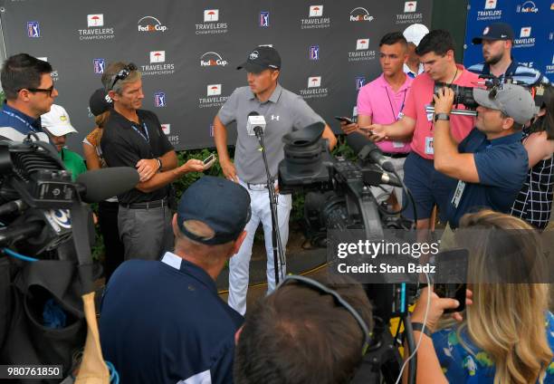 Jordan Spieth talks to the media after his first round of the Travelers Championship at TPC River Highlands on June 21, 2018 in Cromwell, Connecticut.