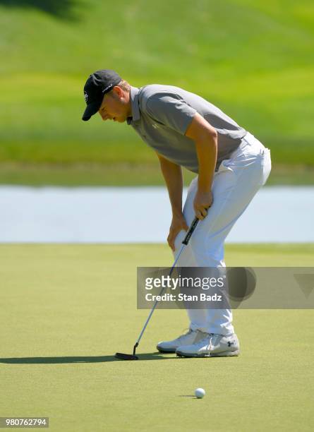 Jordan Spieth reacts to his putt on the seventh hole during the first round of the Travelers Championship at TPC River Highlands on June 21, 2018 in...