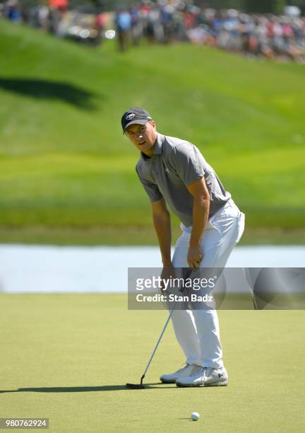 Jordan Spieth reacts to his putt on the seventh hole during the first round of the Travelers Championship at TPC River Highlands on June 21, 2018 in...