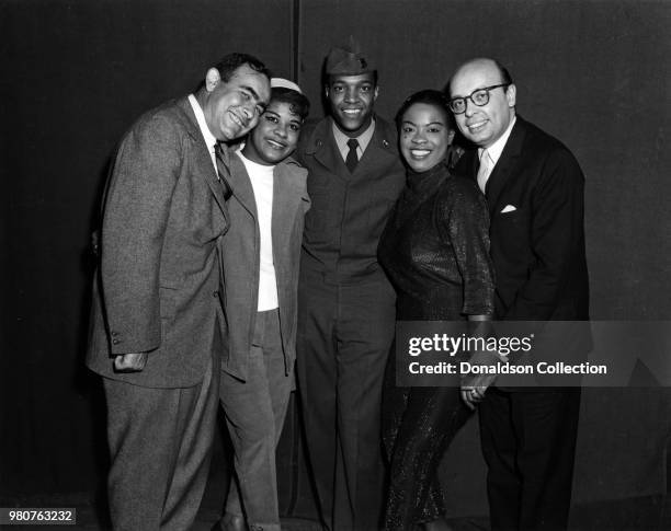 Jerry Wexler, Ruth Brown, Clyde McPhatter, LaVern Baker and Ahmet Ertegun pose for a portrait in 1955 in New York, New York.