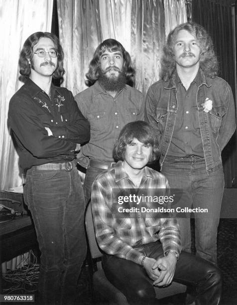 Stu Cook, Doug Clifford, Tom Fogerty, and John Fogerty of the rock and roll band "Creedence Clearwater Revival" pose for a portrait in 1970 in New...