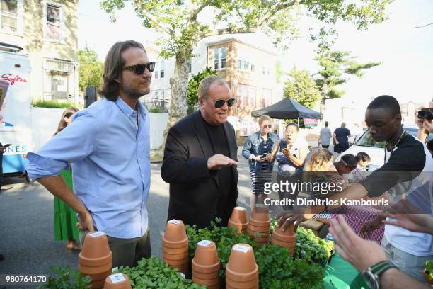 Lance Le Pere and Michael Kors attend as Michael Kors and the New York Restoration Project Celebrate The Opening Of The Essex Street Community Garden...