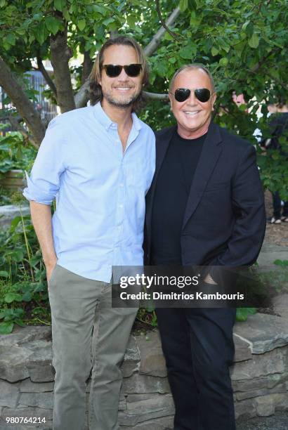 Lance Le Pere and Michael Kors attend as Michael Kors and the New York Restoration Project Celebrate The Opening Of The Essex Street Community Garden...