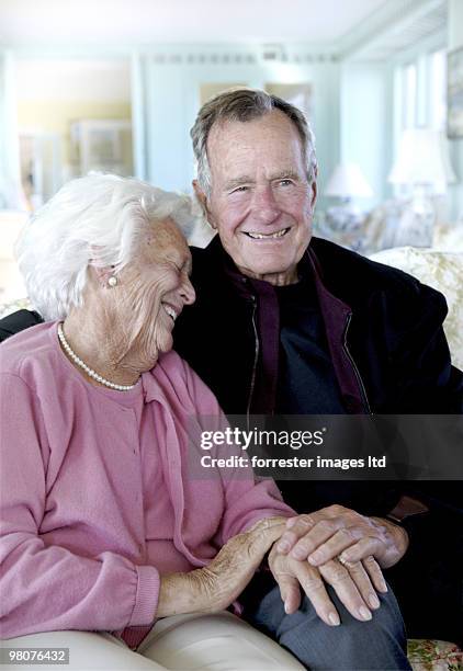 Former President George H.W. Bush with former First Lady Barbara Bush during a portrait session for Parade Magazine at their home in Kennebunkport,...